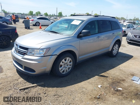 2016 Dodge Journey SE with VIN 3C4PDCAB1GT230387, listed as a IAAI auction lot 42106842 with 157,299 mi miles. Bid and sale history available at carsss.com. Image 2.