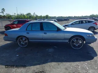 1997 Mercury Grand Marquis LS with VIN 2MELM75W7VX708034, listed as a IAAI auction lot 41878938 with 197,818 mi miles and . Bid and sale history available at DreamBid. Image 13.