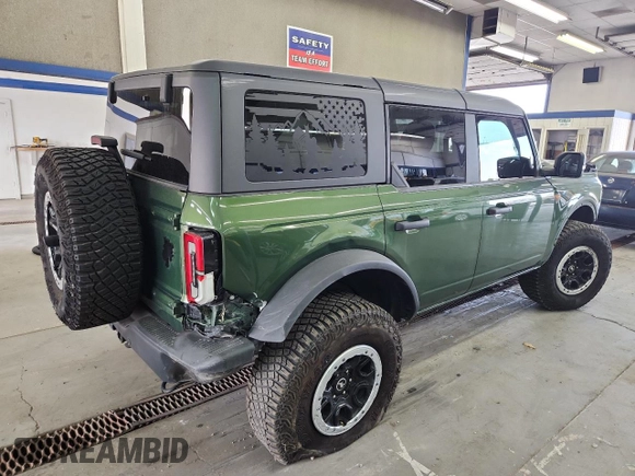 2023 Ford Bronco z VIN 1FMEE5DP9PLB54433, wystawiony jako Copart lot #60074335 z przebiegiem 23 709 mil mil oraz Szkoda całkowita • Salvage title. Historia ofert i sprzedaży dostępna na DreamBid. Obrazek 3.