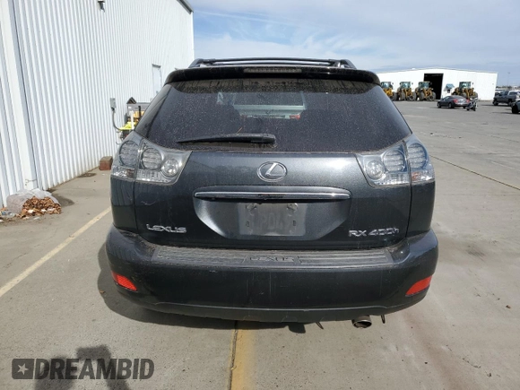 2007 Lexus RX 400h z VIN JTJGW31U972002681, wystawiony jako Copart lot #78883974 z przebiegiem 288 019 mil mil oraz Szkody całkowita. Historia ofert i sprzedaży dostępna na DreamBid. Obrazek 6.