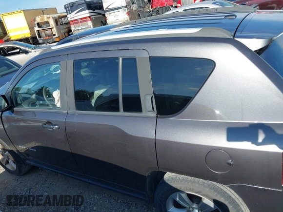 2016 Jeep Compass Sport with VIN 1C4NJDBB0GD511414, listed as a IAAI auction lot 40390327 with 132,120 mi miles. Bid and sale history available at carsss.com. Image 14.