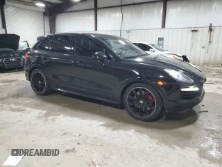 2012 Porsche Cayenne Turbo z VIN WP1AC2A21CLA84144, wystawiony jako Copart lot #82688294 z przebiegiem 124 143 mil mil oraz Szkoda całkowita • Salvage title. Historia ofert i sprzedaży dostępna na DreamBid. Obrazek 4.