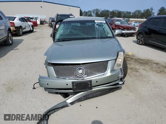 2007 Cadillac DTS Performance z VIN 1G6KD57967U131549, wystawiony jako Copart lot #70918804 z przebiegiem 73 618 mil mil oraz Szkoda całkowita • Salvage title. Historia ofert i sprzedaży dostępna na DreamBid. Obrazek 5.