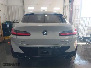 2023 BMW X4 M40i with VIN 5UX43DT03P9R26280, listed as a IAAI auction lot 41318355 with 21,587 mi miles. Bid and sale history available at carsss.com. Image 16.