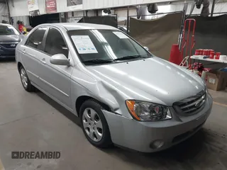 2006 Kia Spectra EX with VIN KNAFE121765262839, listed as a IAAI auction lot 41857689 with 116,817 mi miles. Bid and sale history available at carsss.com. Image 1.