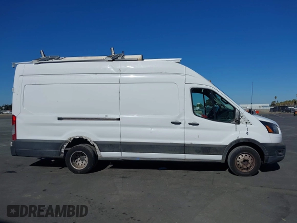 2021 Ford Transit Cargo with VIN 1FTBF4X82MKA74167, listed as a IAAI auction lot 40415831 with 63,943 mi miles and . Bid and sale history available at DreamBid. Image 14.