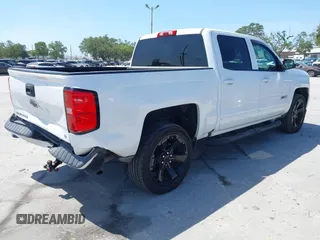 2017 Chevrolet Silverado 1500 LT with VIN 3GCUKREC4HG391101, listed as a IAAI auction lot 42129151 with 84,670 mi miles and . Bid and sale history available at DreamBid. Image 4.