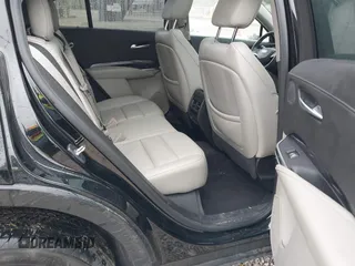 2023 Cadillac XT4 AWD Luxury with VIN 1GYFZBR42PF103973, listed as a IAAI auction lot 41902923 with 70,571 mi miles and . Bid and sale history available at DreamBid. Image 8.
