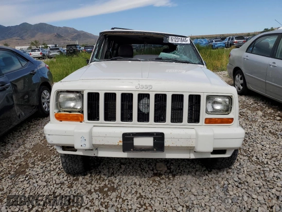 2000 Jeep Cherokee Classic с VIN 1J4FF58S7YL133399, выставлен на аукционе Copart как лот 61231845 с пробегом 196 499 миль миль и Списание • Salvage title. История ставок и продаж доступна на DreamBid. Изображение 5.
