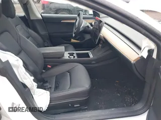 2023 Tesla Model 3 z VIN 5YJ3E1EA6PF570876, wystawiony jako IAAI lot #42366310 z przebiegiem 13 005 mil mil oraz . Historia ofert i sprzedaży dostępna na DreamBid. Obrazek 5.