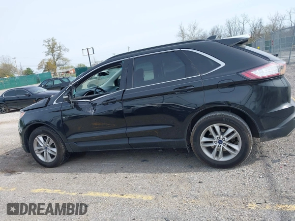 2015 Ford Edge SEL with VIN 2FMTK4J88FBB05259, listed as a IAAI auction lot 42043247 with 128,987 mi miles. Bid and sale history available at carsss.com. Image 14.