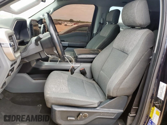 2021 Ford F-150 XL with VIN 1FTFW1E58MFB47964, listed as a Copart auction lot 66567635 with 71,300 mi miles and Clean title. Bid and sale history available at DreamBid. Image 7.
