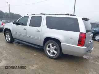 2014 Chevrolet Suburban LTZ with VIN 1GNSCKE05ER173446, listed as a IAAI auction lot 41047096 with 189,049 mi miles and . Bid and sale history available at DreamBid. Image 3.