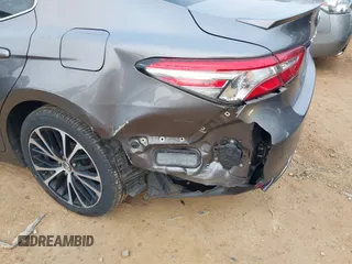 2018 Toyota Camry LE z VIN 4T1B11HK3JU630411, wystawiony jako IAAI lot #41423338 z przebiegiem 134 959 mil mil oraz . Historia ofert i sprzedaży dostępna na DreamBid. Obrazek 6.
