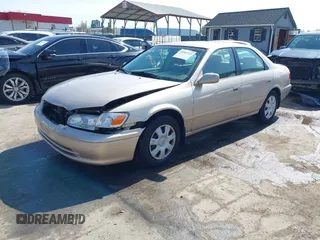 2001 Toyota Camry CE with VIN 4T1BG22K11U114688, listed as a IAAI auction lot 42065715 with 150,181 mi miles. Bid and sale history available at carsss.com. Image 2.