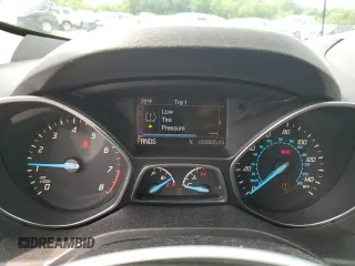 2016 Ford Escape SE z VIN 1FMCU9G97GUB45352, wystawiony jako Copart lot #60001055 z przebiegiem 93 685 mil mil oraz Szkoda całkowita • Salvage title. Historia ofert i sprzedaży dostępna na DreamBid. Obrazek 9.