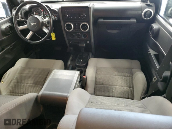 2008 Jeep Wrangler Unlimited Sahara with VIN 1J4GA59108L637009, listed as a Copart auction lot 63333705 with 181,778 mi miles and Clean title. Bid and sale history available at DreamBid. Image 8.