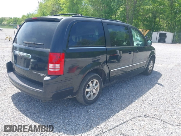 2010 Chrysler Town & Country Touring with VIN 2A4RR5D11AR102714, listed as a IAAI auction lot 42015585 with 176,216 mi miles. Bid and sale history available at carsss.com. Image 4.