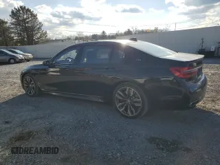 2019 BMW 7 Series M760i xDrive with VIN WBA7H6C55KG615037, listed as a Copart auction lot 80218404 with 43,405 mi miles and Salvage Title. Bid and sale history available at carsss.com. Image 2.