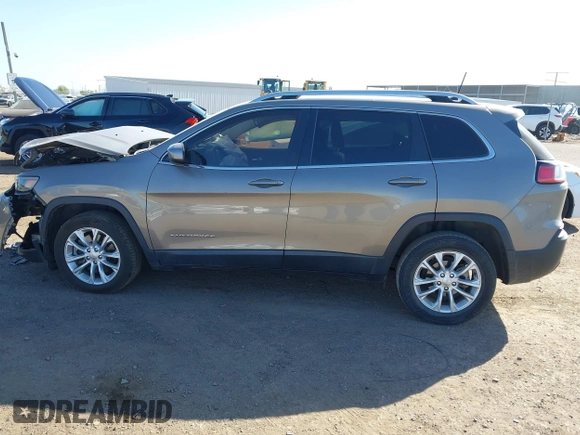 2019 Jeep Cherokee Latitude with VIN 1C4PJLCB2KD474165, listed as a IAAI auction lot 42100594 with 91,363 mi miles and . Bid and sale history available at DreamBid. Image 14.