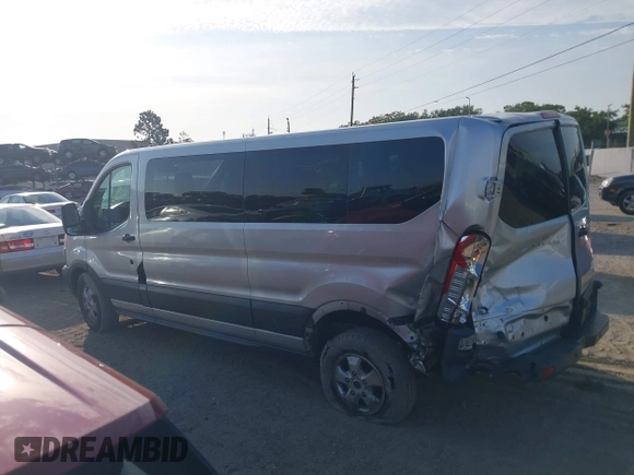 2018 Ford Transit Passenger XL with VIN 1FBZX2YM0JKA70128, listed as a IAAI auction lot 42379000 with 125,309 mi miles and . Bid and sale history available at DreamBid. Image 14.