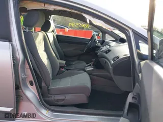 2010 Honda Civic Sdn LX with VIN 19XFA1F55AE071252, listed as a IAAI auction lot 39065549 with 142,676 mi miles. Bid and sale history available at carsss.com. Image 5.