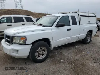 2011 Dodge Dakota z VIN 1D7RW2BK2BS654009, wystawiony jako Copart lot #47311415 z przebiegiem 101 826 mil mil oraz Czysty tytuł • Clean title. Historia ofert i sprzedaży dostępna na DreamBid. Obrazek 1.