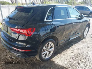 2021 Audi Q3 S line Premium with VIN WA1DECF36M1031852, listed as a IAAI auction lot 42020471 with 29,445 mi miles and . Bid and sale history available at DreamBid. Image 4.