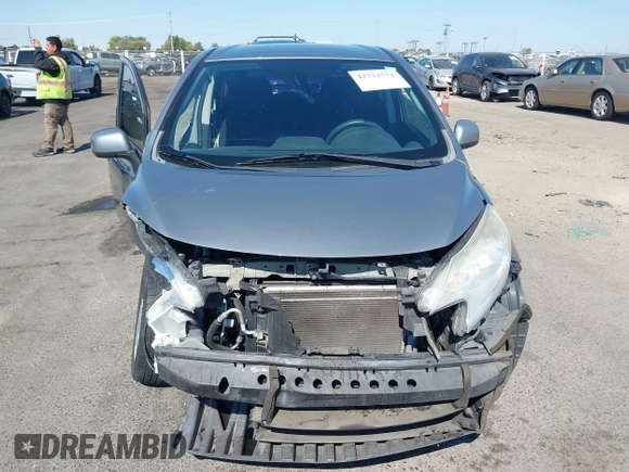 2014 Nissan Note SV z VIN 3N1CE2CP3EL397672, wystawiony jako IAAI lot #42772572 z przebiegiem 117 789 mil mil oraz . Historia ofert i sprzedaży dostępna na DreamBid. Obrazek 13.