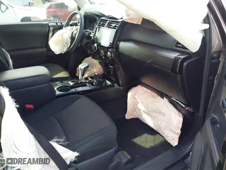 2021 Toyota 4Runner TRD Off Road with VIN JTEPU5JR0M5877962, listed as a IAAI auction lot 41683297 with 61,539 mi miles. Bid and sale history available at carsss.com. Image 5.