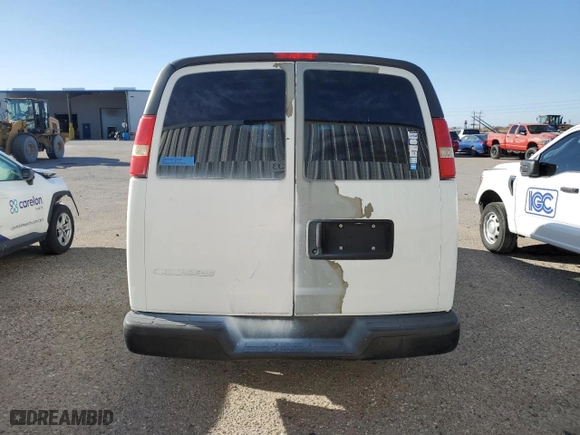 2009 Chevrolet Express Cargo Van with VIN 1GCGG25C191115299, listed as a Copart auction lot 46713485 with 248,217 mi miles and Salvage Title. Bid and sale history available at carsss.com. Image 6.