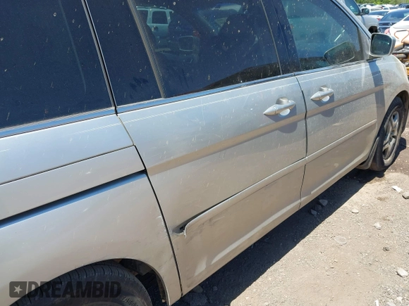 2007 Honda Odyssey EX with VIN 5FNRL384X7B036281, listed as a IAAI auction lot 42058864 with 240,791 mi miles. Bid and sale history available at carsss.com. Image 12.