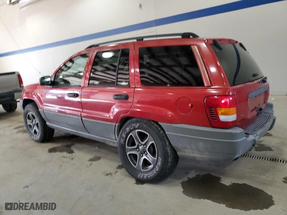 2002 Jeep Grand Cherokee Laredo with VIN 1J4GW48S22C164159, listed as a Copart auction lot 89146265 with 135,087 mi miles and Salvage Title. Bid and sale history available at carsss.com. Image 2.