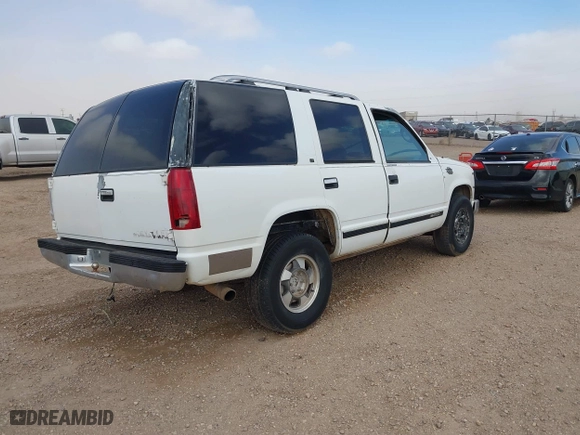 1995 Chevrolet Tahoe with VIN 1GNEK13K8SJ452589, listed as a IAAI auction lot 41788147 with 291,313 mi miles. Bid and sale history available at carsss.com. Image 4.
