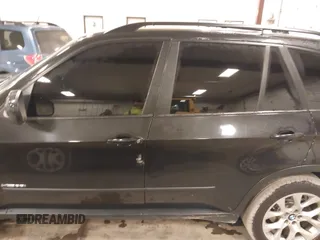 2012 BMW X5 35i with VIN 5UXZV4C55CL990510, listed as a IAAI auction lot 41849293 with 117,522 mi miles and . Bid and sale history available at DreamBid. Image 14.
