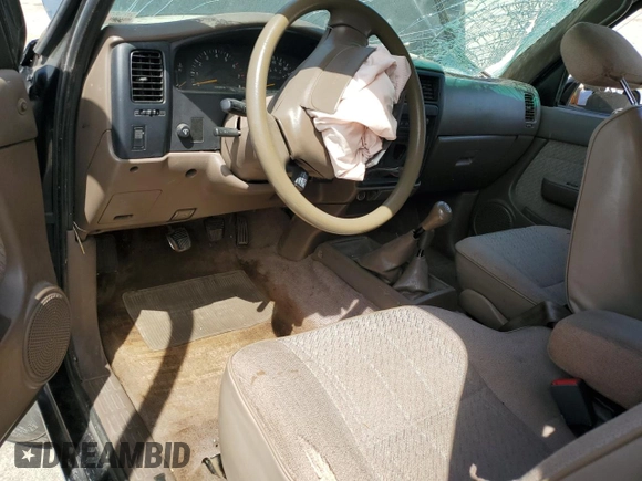 1996 Toyota Tacoma z VIN 4TAWM72N5TZ191278, wystawiony jako Copart lot #57338965 z przebiegiem 233 749 mil mil oraz Szkoda całkowita • Salvage title. Historia ofert i sprzedaży dostępna na DreamBid. Obrazek 8.