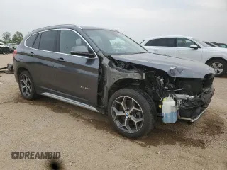 2017 BMW X1 xDrive28i with VIN WBXHT3Z3XH4A53999, listed as a Copart auction lot 60500265 with 43,377 mi miles and Salvage title. Bid and sale history available at DreamBid. Image 4.