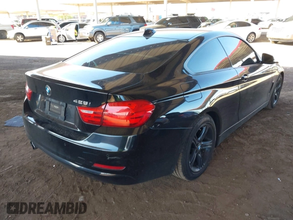 2015 BMW 4 Series 428i with VIN WBA3N3C55FK232613, listed as a IAAI auction lot 41865898 with 104,585 mi miles and . Bid and sale history available at carsss.com. Image 4.