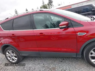 2014 Ford Escape Titanium with VIN 1FMCU9J9XEUD71715, listed as a IAAI auction lot 42127982 with 96,549 mi miles and . Bid and sale history available at DreamBid. Image 13.