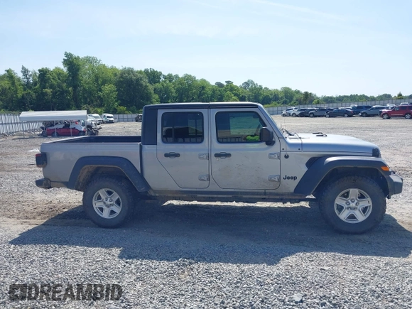2020 Jeep Gladiator Sport S with VIN 1C6HJTAG7LL128940, listed as a IAAI auction lot 42108154 with 90,596 mi miles and . Bid and sale history available at DreamBid. Image 13.