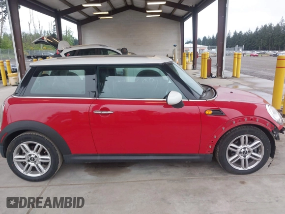 2012 MINI Hardtop with VIN WMWSU3C58CT262077, listed as a IAAI auction lot 42140178 with 70,099 mi miles and . Bid and sale history available at DreamBid. Image 14.