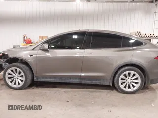2016 Tesla Model X 70D with VIN 5YJXCBE27GF004974, listed as a IAAI auction lot 41630556 with 167,709 mi miles. Bid and sale history available at carsss.com. Image 15.