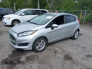 2017 Ford Fiesta SE with VIN 3FADP4EJ2HM116014, listed as a IAAI auction lot 41935876 with 150,435 mi miles. Bid and sale history available at carsss.com. Image 2.
