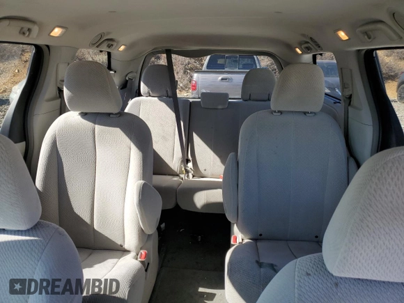 2014 Toyota Sienna LE with VIN 5TDJK3DC7ES081393, listed as a Copart auction lot 46713665 with 184,986 mi miles and Clean Title. Bid and sale history available at DreamBid. Image 10.