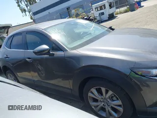 2021 Mazda CX-30 Select z VIN 3MVDMABL3MM233701, wystawiony jako IAAI lot #42086778 z przebiegiem Nie podano mil oraz . Historia ofert i sprzedaży dostępna na DreamBid. Obrazek 14.
