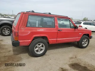 1993 Jeep Cherokee SE with VIN 1J4FT27P2PL619945, listed as a Copart auction lot 59053465 with 222,336 mi miles and Clean title. Bid and sale history available at DreamBid. Image 3.