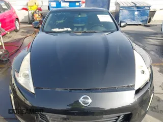 2014 Nissan 370Z Touring with VIN JN1AZ4EH1EM631097, listed as a IAAI auction lot 41230197 with 85,304 mi miles. Bid and sale history available at carsss.com. Image 12.