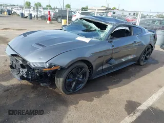 2022 Ford Mustang GT with VIN 1FA6P8CF2N5131421, listed as a IAAI auction lot 42047492 with 21,376 mi miles and . Bid and sale history available at DreamBid. Image 18.