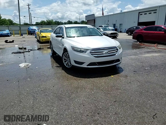 2014 Ford Taurus Limited с VIN 1FAHP2F89EG120939, выставлен на аукционе Copart как лот 59204815 с пробегом 180 105 миль миль и Списание • Salvage title. История ставок и продаж доступна на DreamBid. Изображение 14.