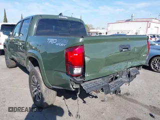 2021 Toyota Tacoma SR z VIN 3TMCZ5AN7MM395940, wystawiony jako IAAI lot #41860127 z przebiegiem 39 338 mil mil oraz . Historia ofert i sprzedaży dostępna na DreamBid. Obrazek 3.